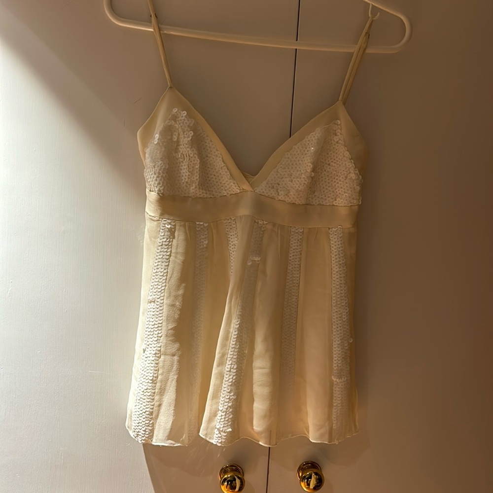 Sequent and chiffon cream tank